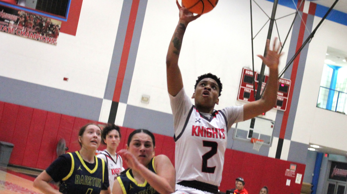 City College freshman center Dahlia Blake (2) goes up for a shot against Barstow College at Harry West Gym, Friday, December 6, 2024. Photo by Danny Straus/City Times Media