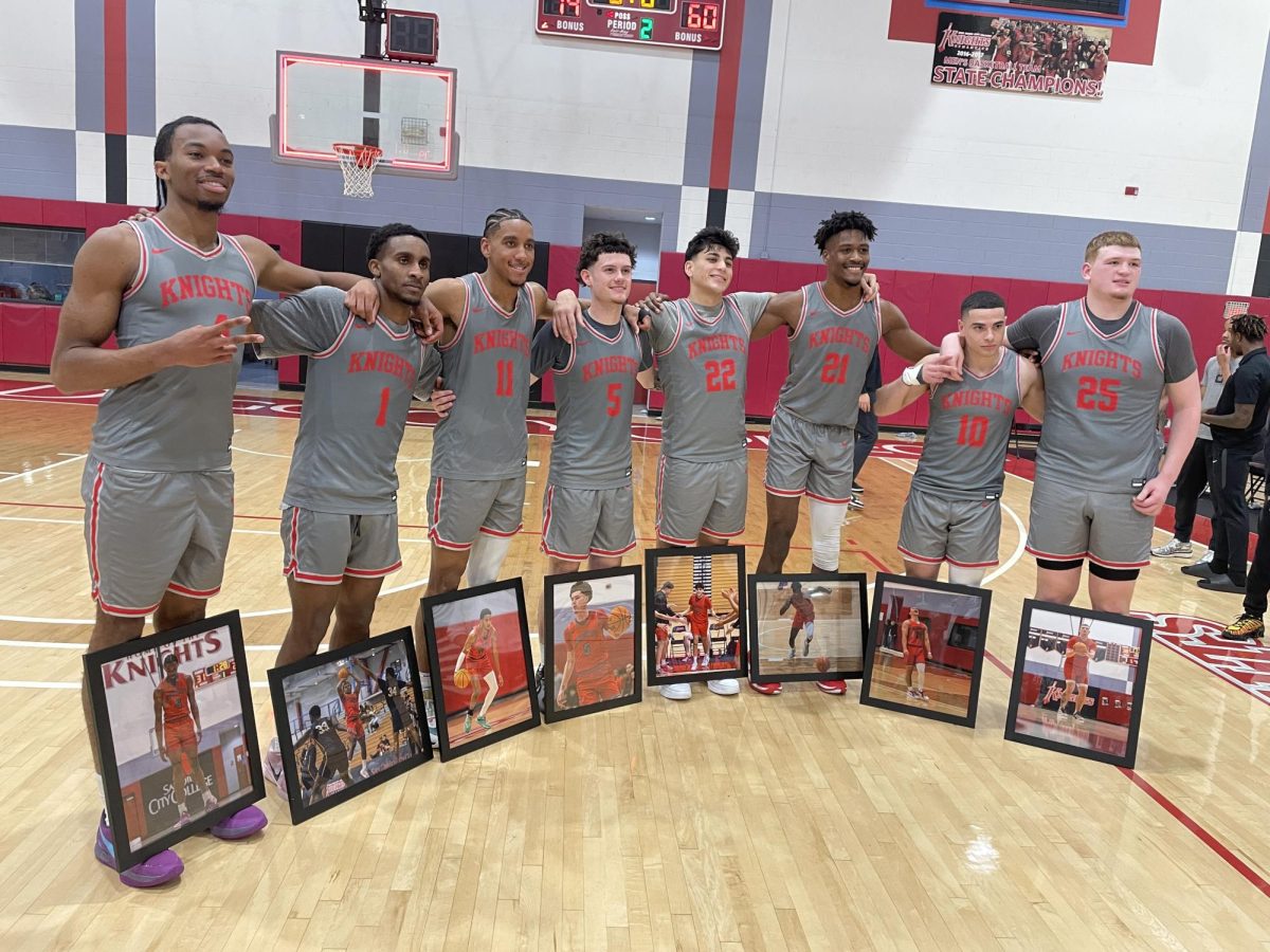 The San Diego City College sophomores pose with their framed pictures after their 79-60 victory over Palomar on sophomore night at Harry West Gym, Friday, Feb. 21, 2025. Photo by Danny Straus/City Times Media 