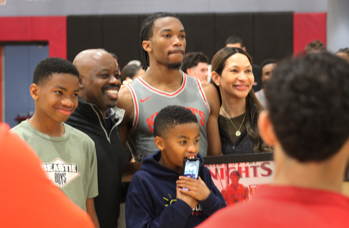 PCAC second team all conference selection Reid Celestin (4) poses with his family on sophomore night after City's 79-60 victory over Palomar at Harry West Gym, Friday, Feb. 21. Photo by David J Bohnet/City Times Media 