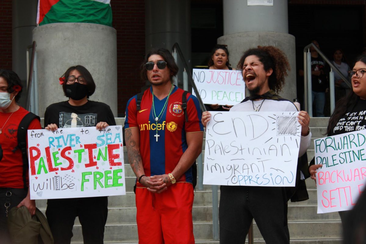 A line of protestors chant “Shame” at the steps of the AH-FreeSpeechZone Thursday, Feb. 27, 2025. Photo by Nadia Lavin/City Times Media