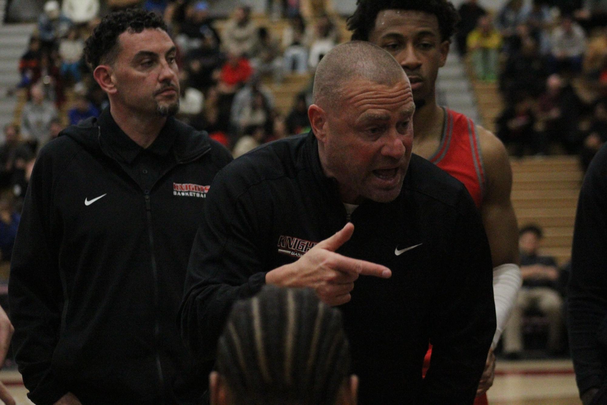 Coach Mitch Charlens instructs his team during a timeout at Harry West Gym, Saturday, March 1, 2025. Photo by Nadia Lavin/City Times Media
