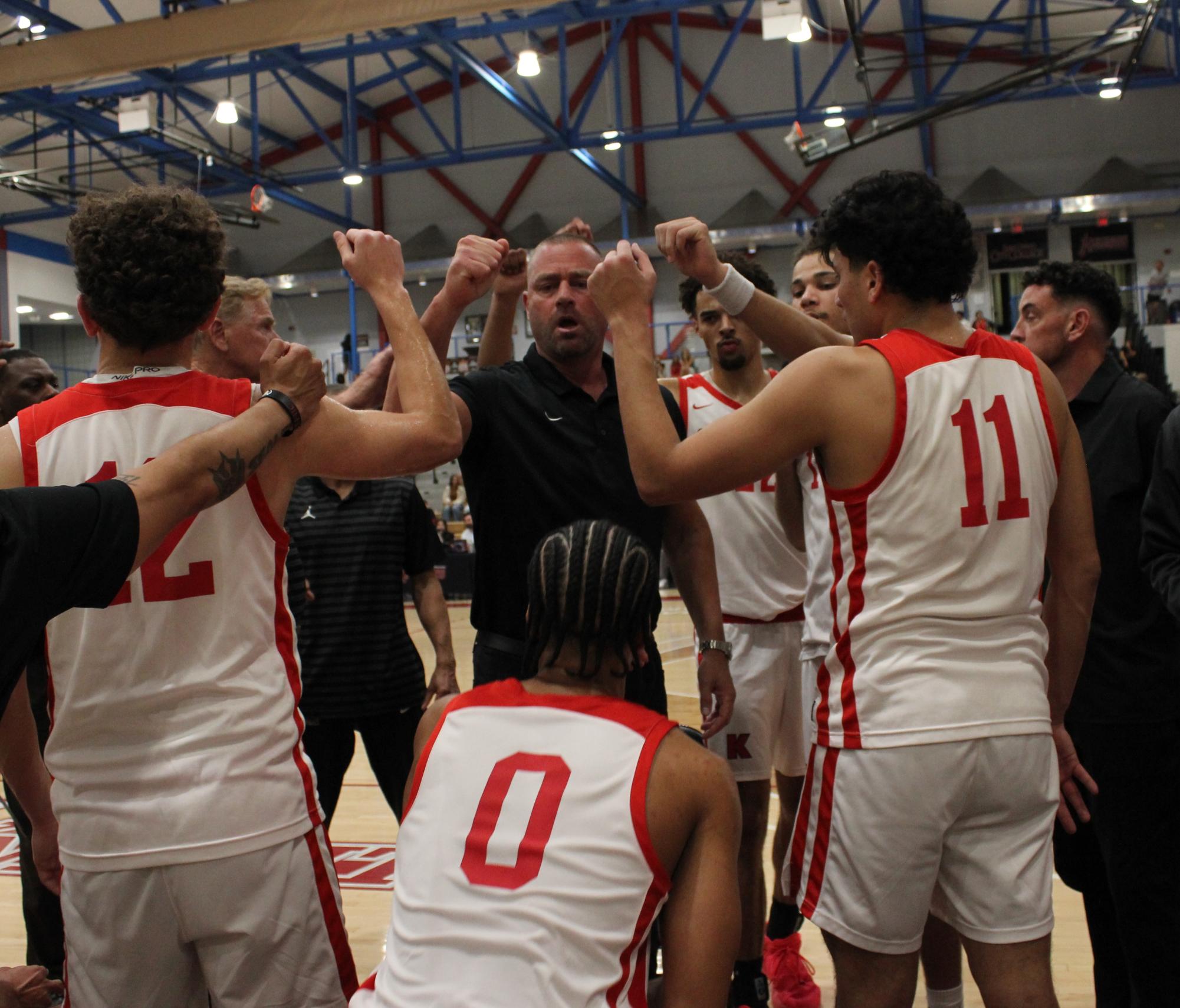 City College men's basketball team raise their fists up with City's coaching staff before checking back into the game against Saddleback College at Harry West Gym, Saturday, Feb. 28, 2026. Photo by Nadia Lavin/City Times Media