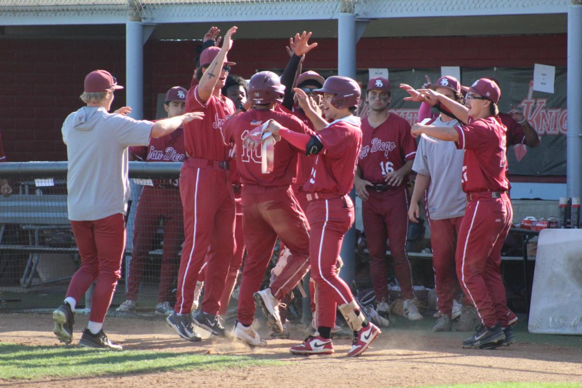 The City College baseball bench celebrates a run scored by Chris Marquez (10) at Morley Field. City would snap a nine-game losing streak in a 10-9 win against Imperial Valley, Tuesday, March 24, 2026. Photo by David J. Bohnet/City Times Media
