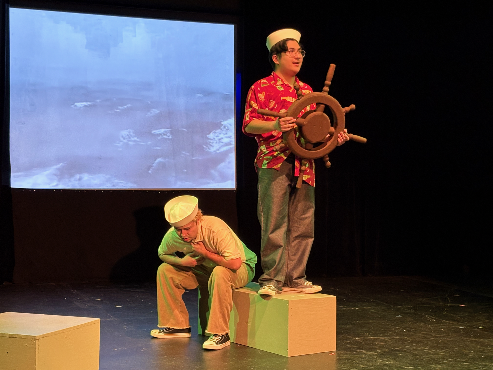 An ill sailor, played by Quipachtli Martinez, left, regrets his decision to partake on a voyage, while a fellow sailor, played by Ty Menor, right, encourages him to continue in the 11th Annual Festival of New Plays at the Black Box Theater, Thursday, March 19, 2026. Photo by Crow Ruiz/City Times Media