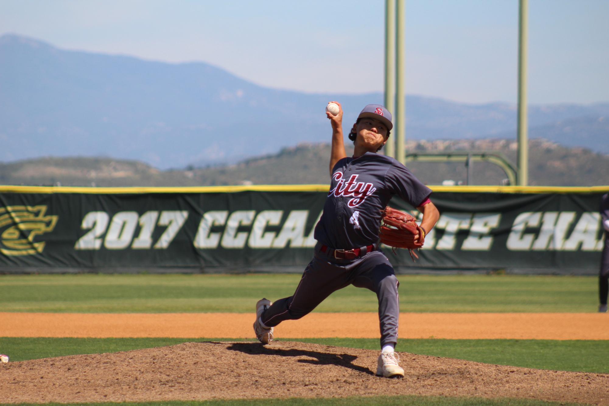 San Diego City College pitcher Aiden Kuei fires a pitch from the mound against Grossmont College, Saturday, March 14, 2026. Kuei struck out 10 batters in six innings pitched at Noel Michelson Field. Photo by David J. Bohnet/City Times Media
