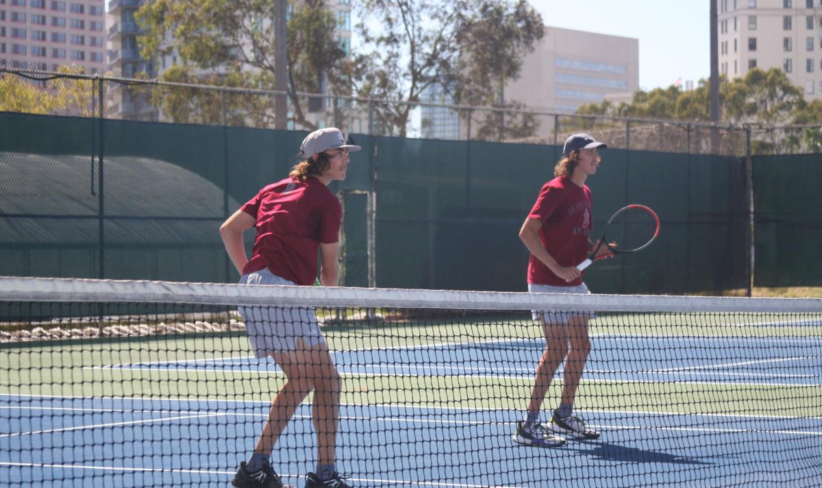 Hunter Lynch, left, defends with his twin brother Thomas Lynch, right, in a doubles match as they anticipate their opponent’s move at the Odus Morgan Tennis Center, Thursday, March 19, 2026. Photo by Chrisdan Peralta/City Times Media