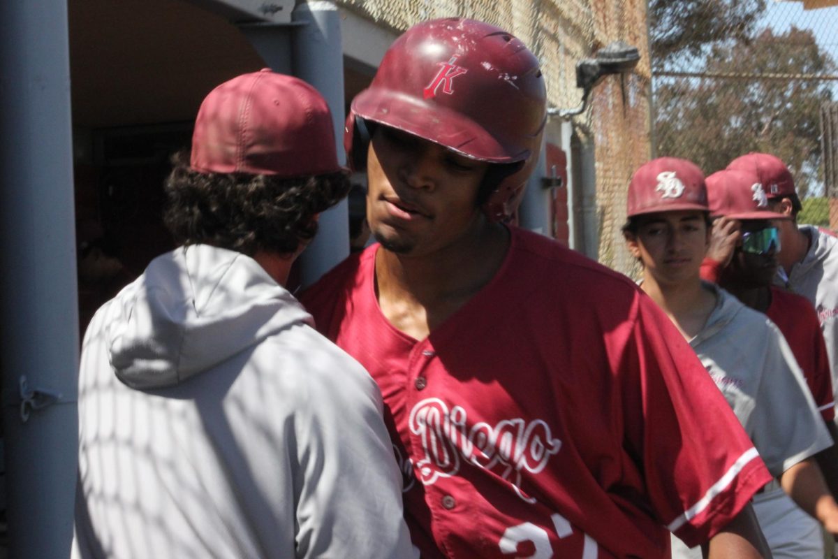 City College pitcher Luke Weckerle, left, celebrates with outfielder Andres Johnson, right, in the Knights' dugout after Johnson scored a run at the bottom of the first inning to put the Knights up ,2-0, against Southwestern at Morley Field, Friday, April 24, 2026. Photo by Azriel Castaneda/City Times Media