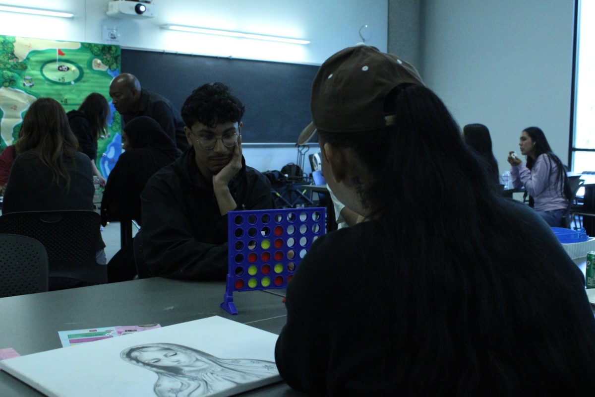 Psychology student Carlos Gonzalez, left, and Civil Engineering student Andres Cruz focus as they play their game of Connect Four, Monday, April 13, 2026. Photo by Tresean Osgood/City Times Media