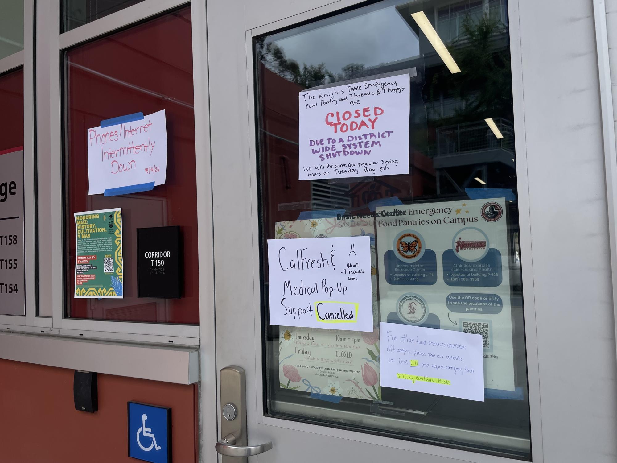 San Diego City College students hoping to visit the Basic Needs Center find signs indicating the office is closed to due a "districtwide system shutdown," Monday, May 4, 2026. Photo by Itzel Martinez/City Times Media